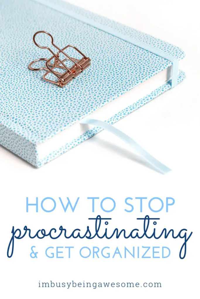 Blue planner with clip; How to stop procrastinating and get organized.