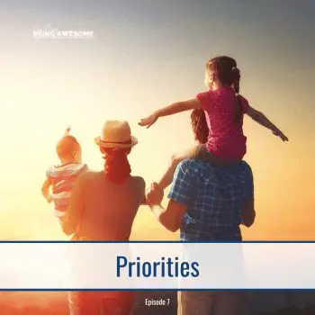 Family enjoying sunset, prioritizing time together.