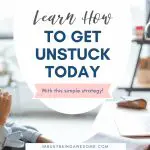 Woman thinking at her desk with laptop; Learn how to get unstuck.