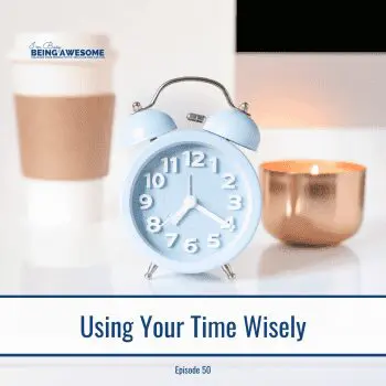 Blue alarm clock, coffee cup, candle. Using Your Time Wisely.