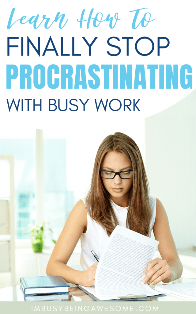Woman reviewing papers, perhaps procrastiworking by doing busy work.