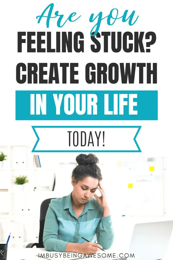 Stressed woman at desk, feeling stuck. Text: "Are you feeling stuck? Create growth in your life today!