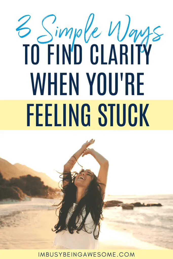 Woman on beach raising arms, text: 3 Simple Ways to Find Clarity When You're Feeling Stuck.