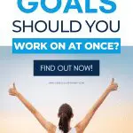 How many goals should you work on at once? Find out now! A woman celebrates success.