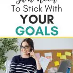 Woman on phone at desk with laptop, "The #1 Practice You Need To Stick With YOUR GOALS