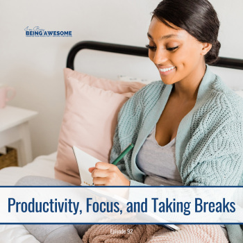 Woman smiling, writing in a notebook on her bed. "Productivity, Focus, and Taking Breaks.