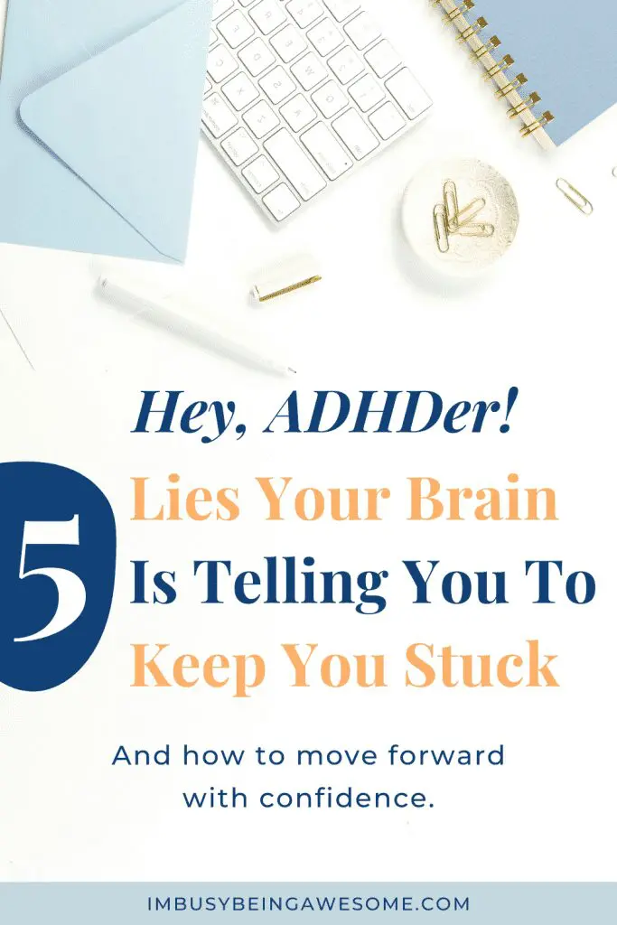 Overhead shot of desk with keyboard, paperclips, and text: "Hey, ADHDer! 5 Lies Your Brain Is Telling You To Keep You Stuck.