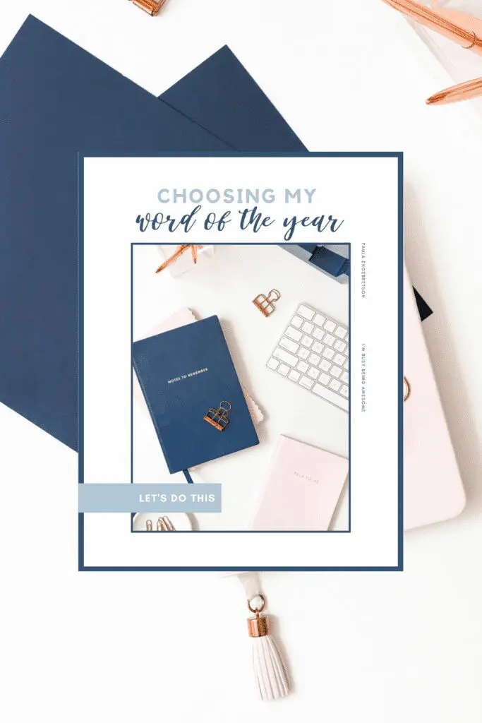 Choosing my word of the year workbook cover featuring a desk with notebooks and a keyboard.