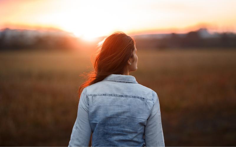 woman nature at sunset