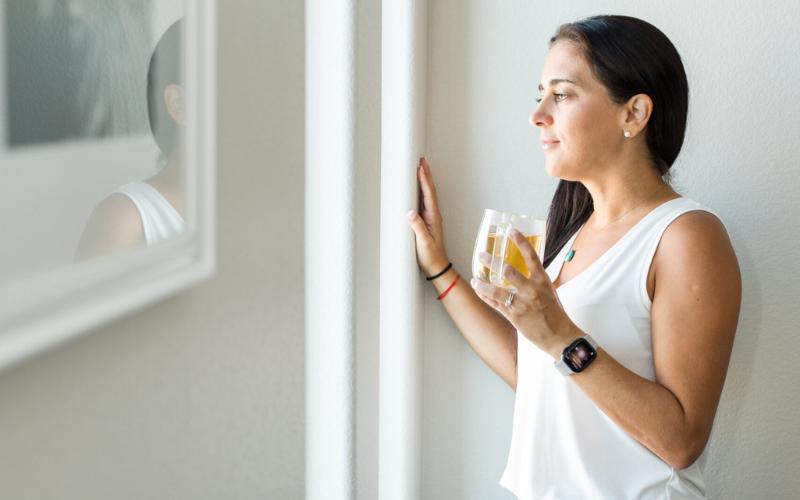woman looking out of window