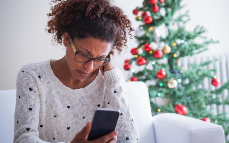 woman christmas looking worried