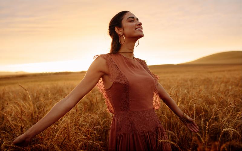 woman feeling happy in nature