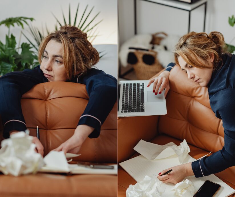 Woman with ADHD working on laptop, surrounded by crumpled paper, struggling to relax.
