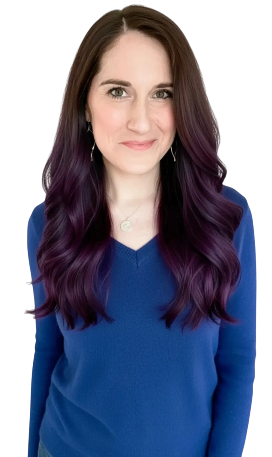 Paula with purple-tinted hair smiling